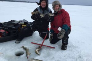 rick fowler with his father's tip ups houghton lake